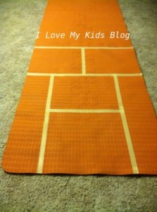DIY Indoor hopscotch mat make lines
