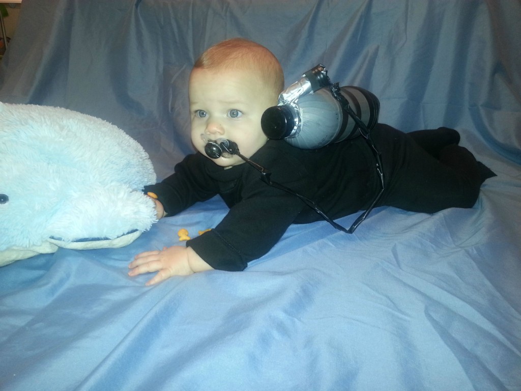 Baby contact with dolphin